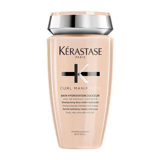Kérastase Curl Manifesto shampoo bottle — defines and nourishes curly hair for soft, hydrated, and frizz-free curls.