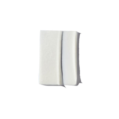 Kérastase Discipline hair mask texture — rich formula that smooths frizz and deeply nourishes hair for soft, manageable strands.