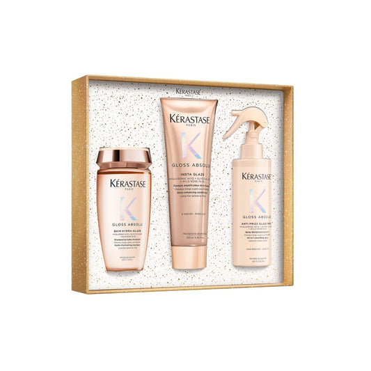 Kérastase Gloss Absolu holiday gift set with 25% savings,  including shampoo, conditioner, and glaze spray — for radiant, shiny, smooth hair.