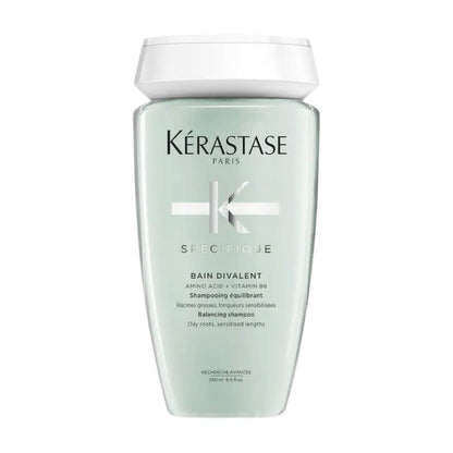 Kérastase Spécifique Bain Divalent shampoo bottle — balances oily roots and dry ends while maintaining a healthy scalp and hair.