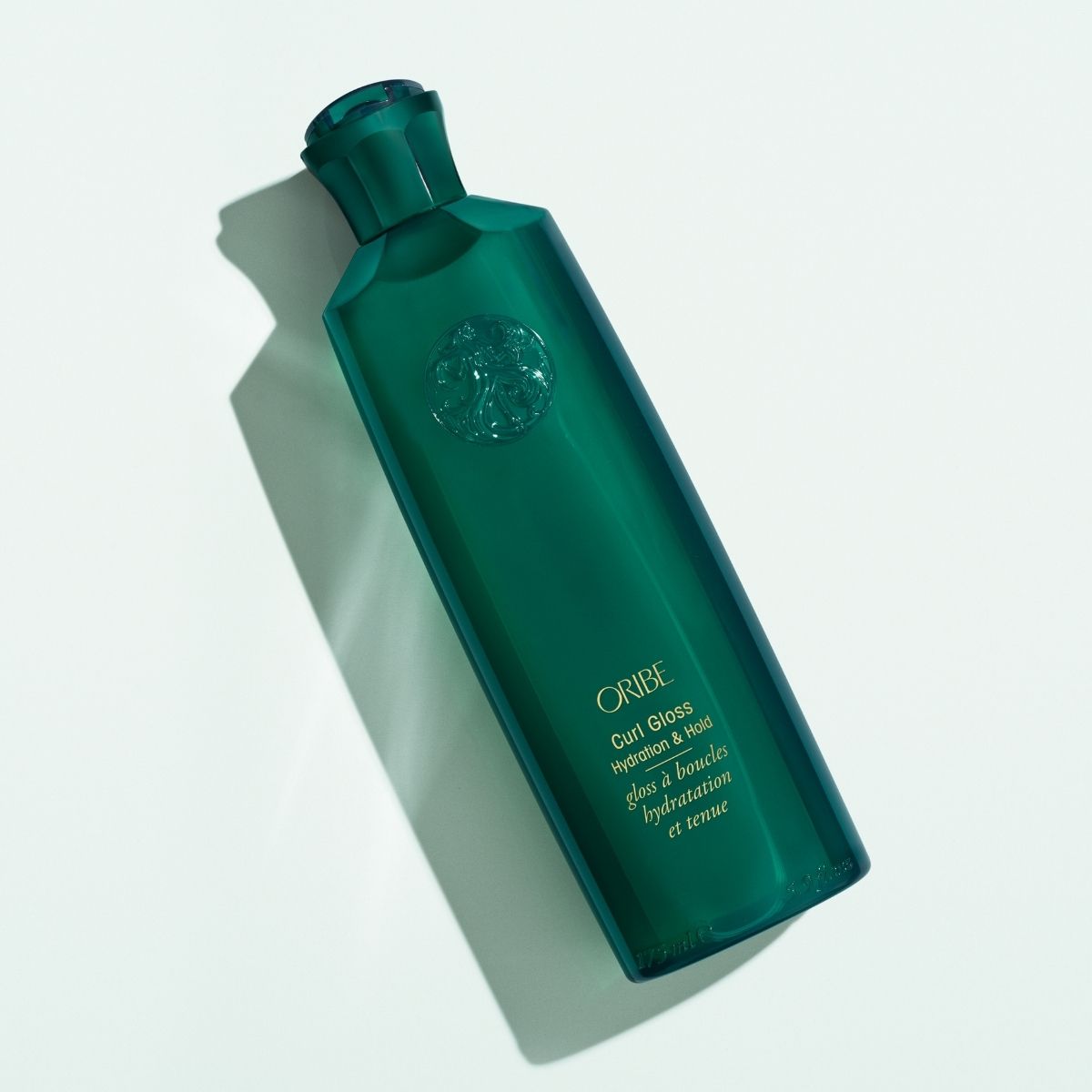 Oribe Curl Gloss – Professional Haircare for Shiny, Defined Curls, Angled View