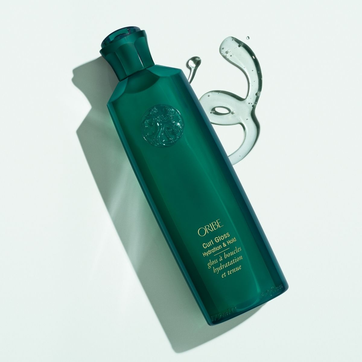 Oribe Curl Gloss – Close-Up Texture of Professional Haircare for Defined, Shiny Curls