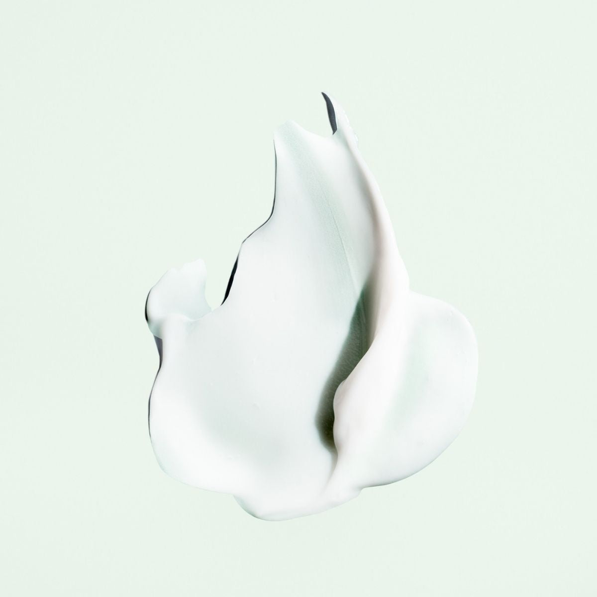 Oribe Styling Butter – Close-Up Texture of Luxury Haircare for Smooth, Manageable Hair